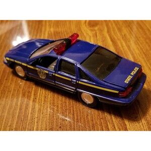 New York State Police Road Champs die cast police car 1:43 scale